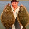 George -Dad- Parkman of Cypress, TX took this 24 and 20 inch flounder fishing a jig n'minnow.