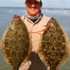 Caleb Parkman of Cypress, TX took these two big flatfish on jig n'minnow.