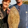 Fishing couple Tim and Donetta from Jacksonville, TX landed this nice flounder on finger mullet.