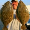 Crystal Beach angler Richard Sanders gulped up these 22 and 23 inch flounder on a berkley soft plastic.