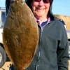 Bill Neu of Houston caught this 18 inch flounder on live shrimp.