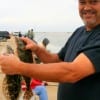 Lonnie Johnson of Pearland, TX took these two keeper flounder on finger mullet.