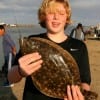 Tyler Makesh of League City, TX nabbed up this 18 inch flounder caught on finger mullet.