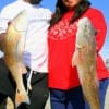 Mr. and Mrs. Roosevelt Whright of Houston show off their redfish caught on shrimp.