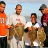The Fort Hood Smith family teamed up with the Rayne, TX Guidry's to catch these 21,22,23 and 24 inch flounder of berkley gulp.
