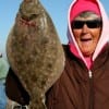 Barbara Singleton of Winnie, TX nabbed up this 19 inch flounder fishing finger mullet.