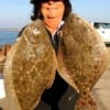 Joy Linton of Houston landed these 2 big flounder fishing Ms Nancys mud minnows.