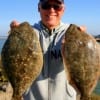 Former Marine Captain Hollis Gassen of Crystal Beach, TX landed these two big flounder on berkley gulp.