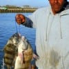 Michael Dickerson of Houston tethered up thse keeper drum fishing shrimp.