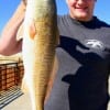 Brandon Streeter of Winnie TX took this 27 inch slot-red while fishing shrimp.