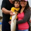 Mr and Mrs Tommy Newsom with young Kaegen heft ther 4lb speck.