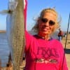 Sharon Barker of  Kuntze, TX displays an 8lb Ed Snyder speck he caught and released while  fishing soft plastics.