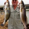 Jean Scurtu of Houston filled his box with trout such as these 6 and 8 lb specks he caught on crappie jigs.