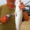 James Fontenot of Alvin, TX shows off his 5lb speck caught on plastic.