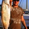 Former Marine Paul Borut of Silsbee, TX hefts this 6lb speck, one of many he caught nightfishing.