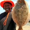 Quinn  Carlis of Houston took this nice flounder on shrimp.