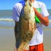 IMG_0034- Rusty Garland of Tatum TX surf fished with cut mullet for this 36inch tagger bull red-