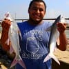 Manuel Garcia of Houston took these two gafftop on mullet.