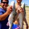 Fishin buds, active duty Army soldier Tim Soto and Chris Reyes of Rosehill FD show off their gafftop caught on shrimp.