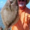 Retired Police Officer William Weston of Nederland, TX took this nice flounder on finger mullet.
