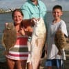The Family that fishes together- the Browns of Spring, TX had a great time here at rollover catching flounder and reds on miss nancy shrimp.