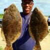 Tony Yancey of Houston took these two flounder on finger mullet.