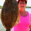 Jan Blackwood of Lufkin, TX displays her nice flounder she caught on a jig n'shrimp.