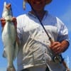James Simon of Huntsville, TX nabbed this 23inch speck from the surf on a mirror lure.