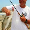 Palistine, TX angler Gregg Carroll took this 24inch- 5lb speck while surf wading a SFT Mirror Lure.
