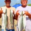 Fishin buds- TJ Broussard of Caldwell and Billy Reynolds of Dawson TX show part of thier surf wading fishing trout catch they took on mirror lures -