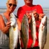 Sharon, who outfished her hubby Barker of Kountze, TX waded the surf for these nice specks