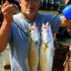 James Fontenot of Alvin TX hefts these two nice trout caught on Mirro-Lures