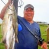 The Specks Are In The Surf!! Announced Dennis Boeker of High Island when showning off this nice stringer he caught on a Mirror Lure