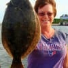 Baytown anglerette Kim Aldy fished a finger mullet to catch this 21inch doormat flounder