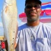Brian Davis of Humble TX caught this 24 inch slot red on live shrimp
