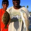 Calvin and Ruth Smith of Houston teamed up to catch this nice flounder and red on shrimp
