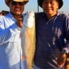 Father and Son- Rolly and Jonry Edmalin of Sugar Land TX teamed up to catch this nice 24inch slot red on shrimp