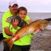 Father and son- Nate Sanford and Nicholas of Humble TX shared the spotlight with a drum and red they caught at rollover pass