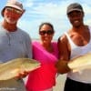 Fishin Buds- Charles and Dante Lesly along with Erica Domingues of Houston teamed up to catch these nice reds on shrimp