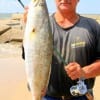 Getting surfed by the surf, George Brian of Beaumont stuck it out with a mirro-lure to catch this 26 inch, 6.5 lb speck