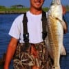 Jake Little of Round Rock TX fished a finger mullet to catch this 26inch slot red