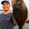 Javier Flores of Katy TX gigged this nice flounder on Rollover Bay Flats