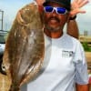 Karl (fingers) Devers of Houston managed to cacth this nice flounder on finger mullet