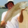 Marty Rogers of Gilchrist TX landed this nice 27 inch slot red on finger mullet