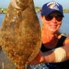 Port Bolivar TX anglerette Nancy Talley caught this nice flounder while fishing a rootbeer-chartreuce Berkley Gulp