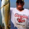 Robert Fo of Bridge City TX fished srimp to catch this 23inch slot red