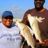 The Bradleys from Houston caught these two slot reds on live shrimp