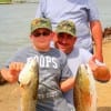 Three Generations, Grandpa, Dad, and 10yr old Dylan Johnson of Hardin TX took these nice reds on finger mullet