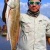 Adolfo Rodriguez of Spring TX nabbed this 27 inch slot red on a finger mullet