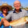 After 58 yrs of marriage, Mr and Mrs Carl Sommer are still fishing together as shown here with their nice slot red